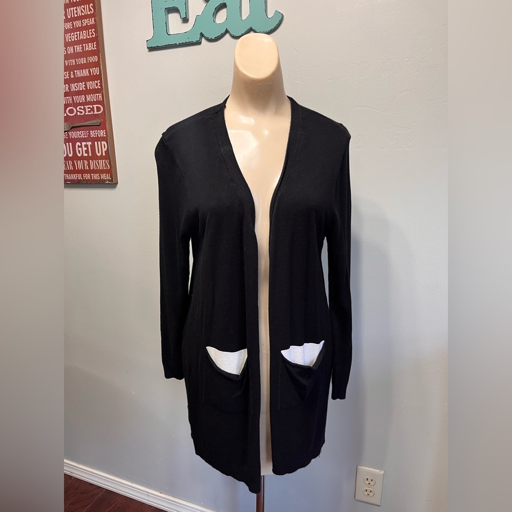 Black/white cardigan with quote on back. Super cute!size medium